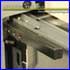 Greasing the rail on an embroidery machine